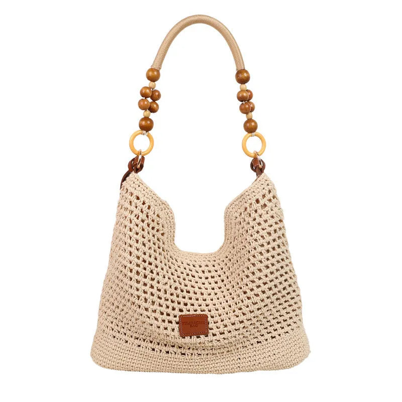 Large knitted beach tote bucket bag in black or brown with zipper compartment and contrasting stitching