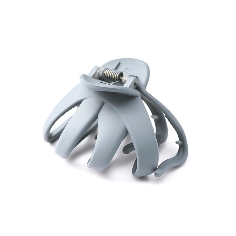 Children's hair clips in small and large sizes with green, dark blue, wine red, black, dark pink, and blue grey colour options