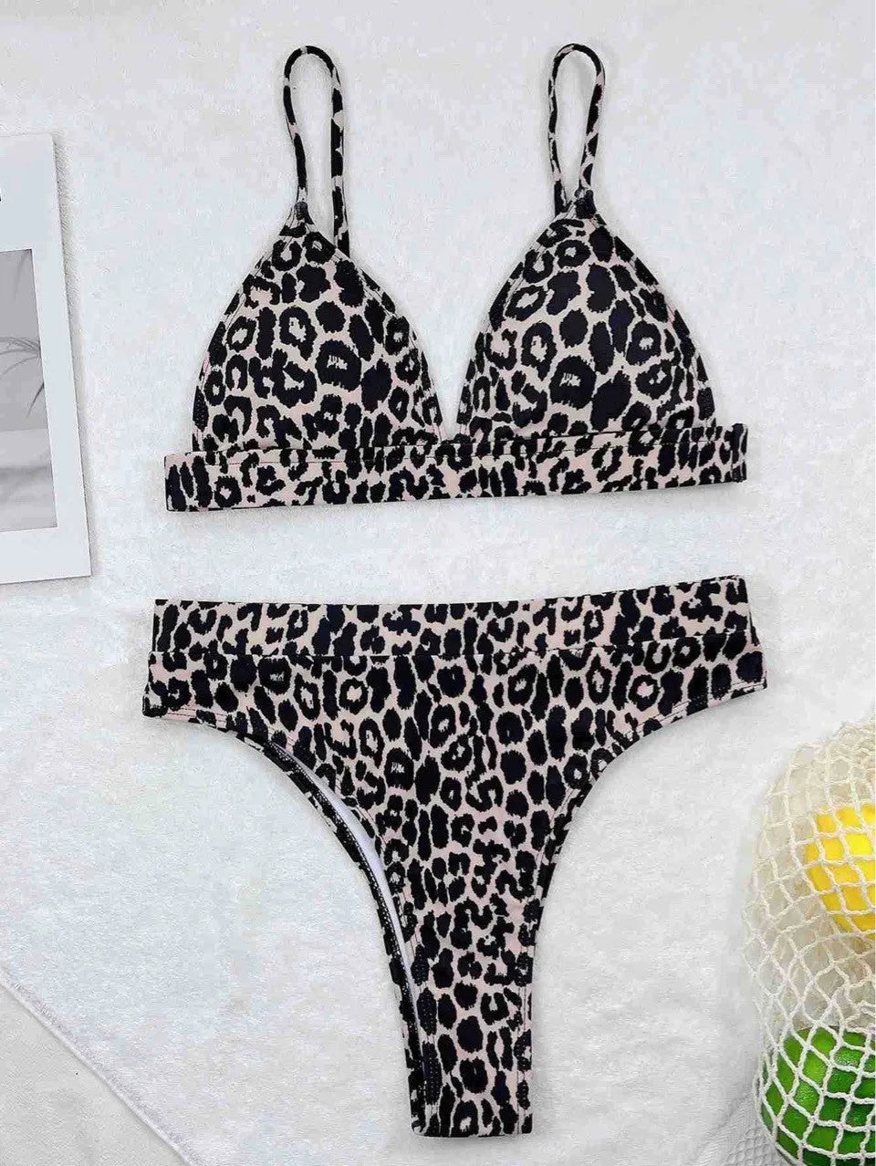 Leopard print women's bikini swimsuit with backless briefs style, polyester fabric and spandex lining, sizes S M L