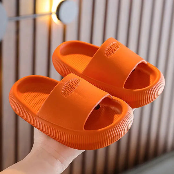 Colourful children's EVA slippers with a non-slip sole, shown in mixed colours on a white background.