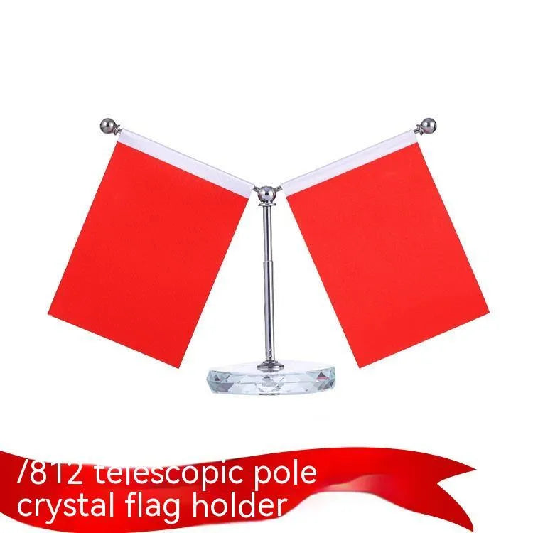 Adjustable metal telescopic rod decoration with a coloured polyester flag on a stand, shown on a car dashboard.