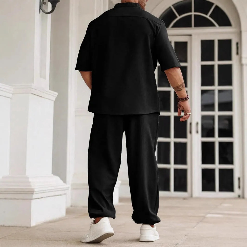 Men's apricot coloured cotton linen casual short-sleeve shirt and long trousers set laid flat