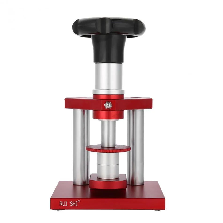 Watch repair spiral presser tool with a set of 20 plastic moulds for case backs on a grey surface