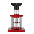 Watch repair spiral presser tool with a set of 20 plastic moulds for case backs on a grey surface