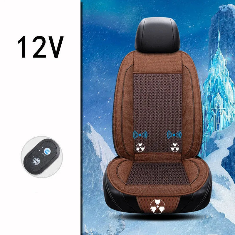 Square black car seat cushion with ventilation and massage functions on a car seat.