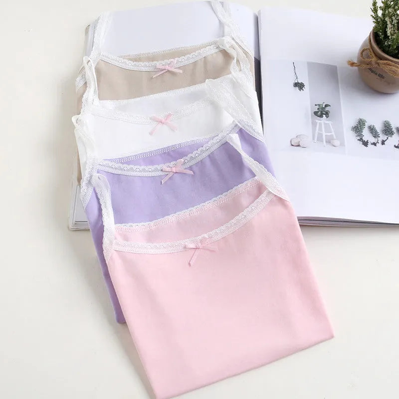 Girls' pure cotton lace vest with bow detail, available in multiple colours and sizes for heights 100-150 cm