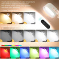 White plastic remote touch magnetic wall lamp showing oval light panel and remote control