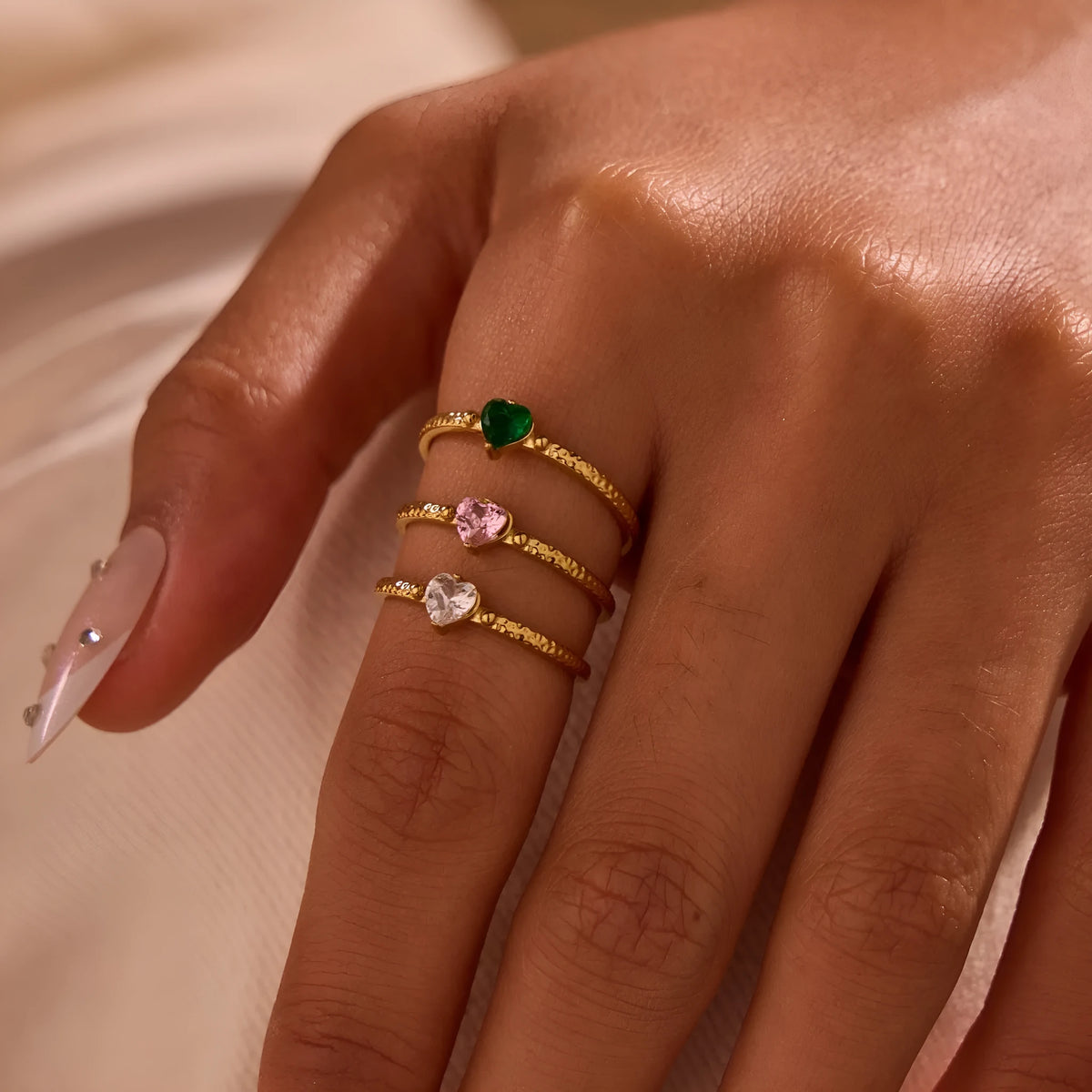 Open mouth geometric ring with a love heart shape and inlaid zircon, in stainless steel.