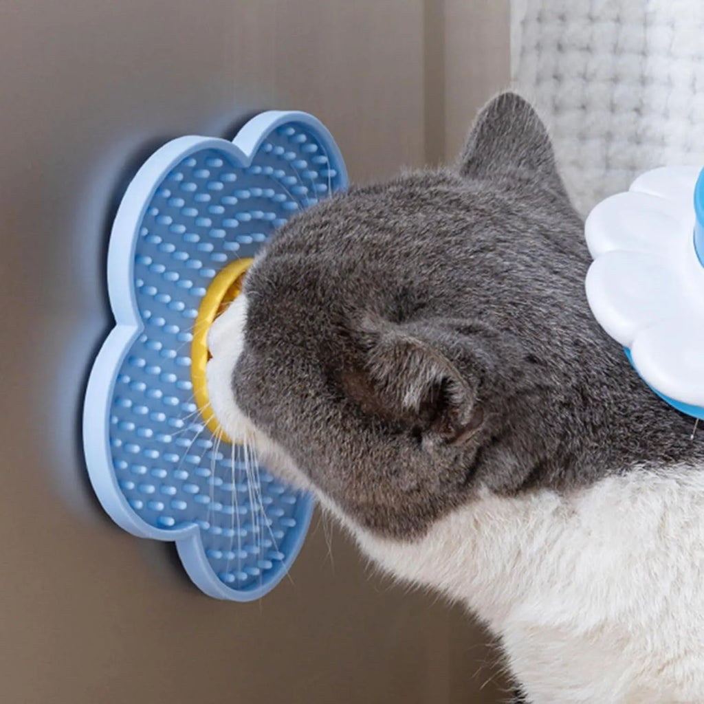 Flower-shaped silicone lick mat for cats and dogs with suction cups on the base, shown in a choice of colours.