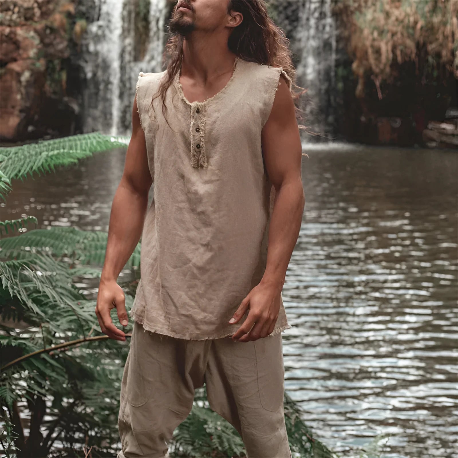 Men's solid colour linen vest with loose fit, round hem, and printed detailing in a casual style