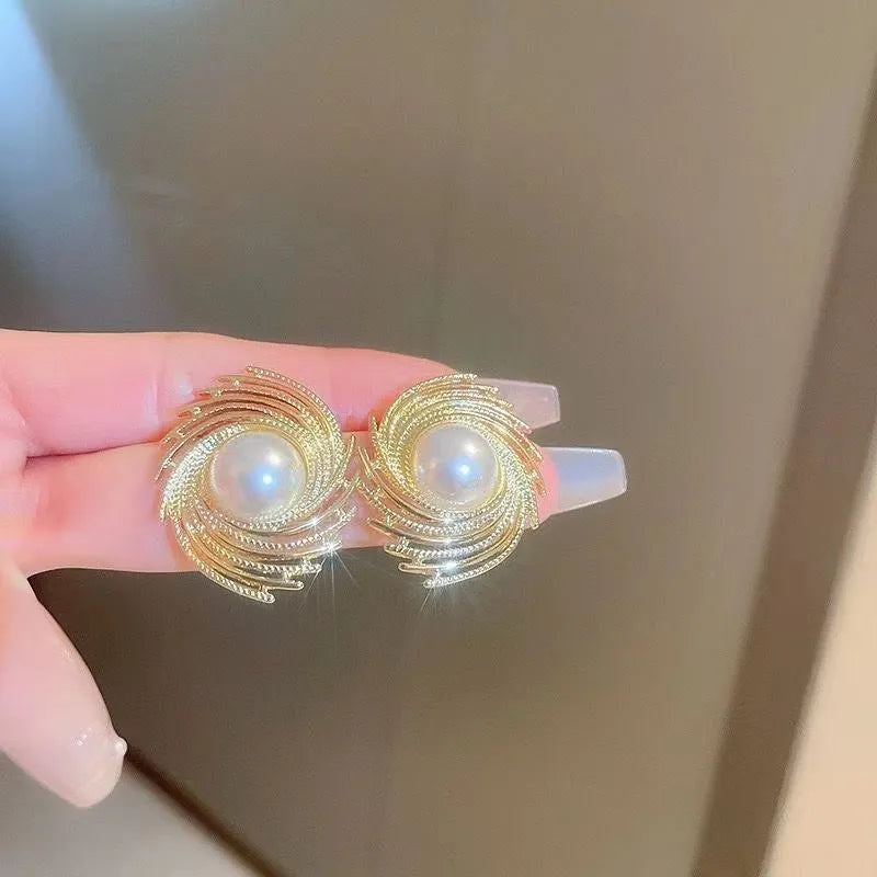Women's vintage pearl earrings with exaggerated flower shape and electroplated alloy construction