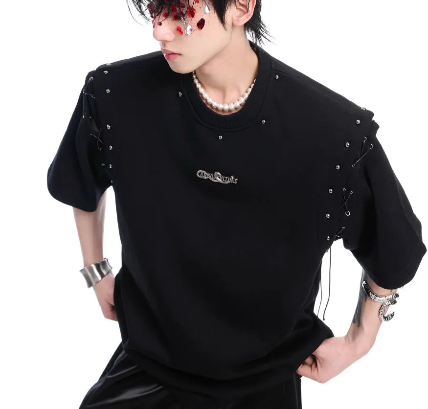 Women's black short sleeve t-shirt with lace-up detail and cutout design on front.