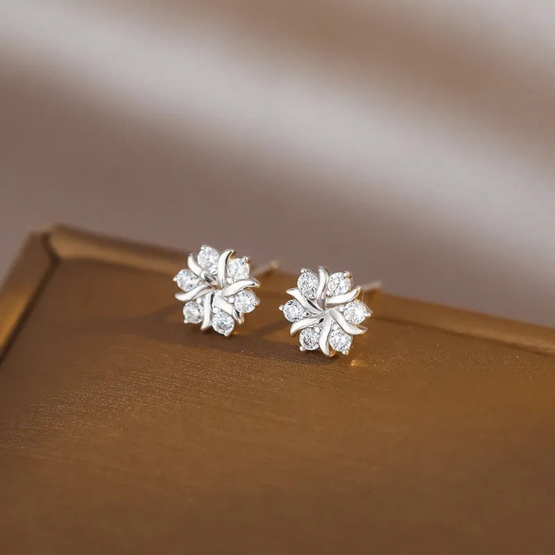 Snowflake ear stud earrings for women, copper electroplated silver colour, geometric zircon design