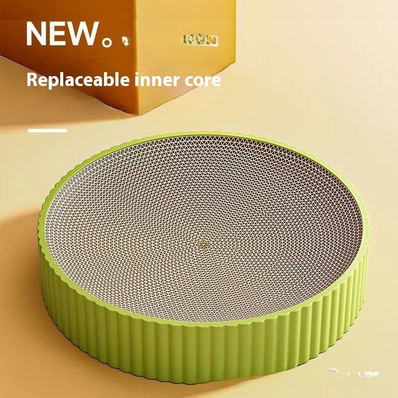 Green and white round cat scratching board with corrugated paper centre and raised nest edge.