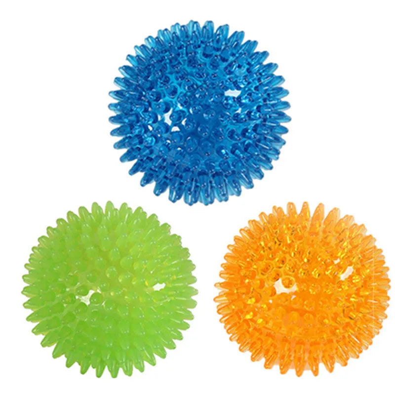Large dog vocal toy ball in green TPR material with squeaker, 11cm diameter, on a white background