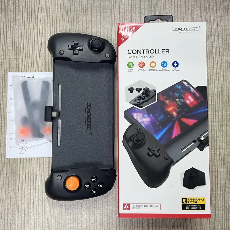 Black and white portable gamepad handle for Nintendo Switch console with integrated charging port.