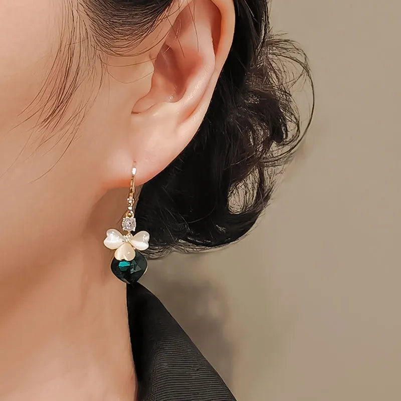Electroplated blue crystal earrings with bow shape on alloy base