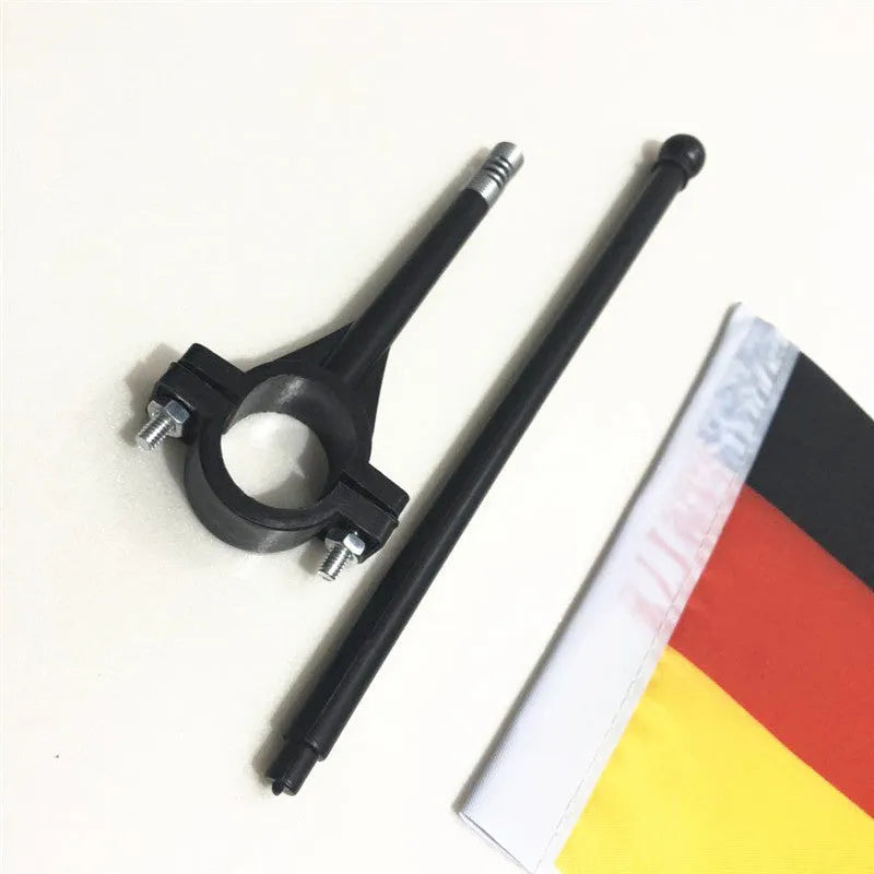 A square polyester fabric flag on a plastic handlebar flag pole for bikes and cars.