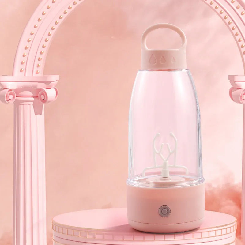 Automatic electric shaker bottle in green, pink, or white with USB charging port and carry handle.
