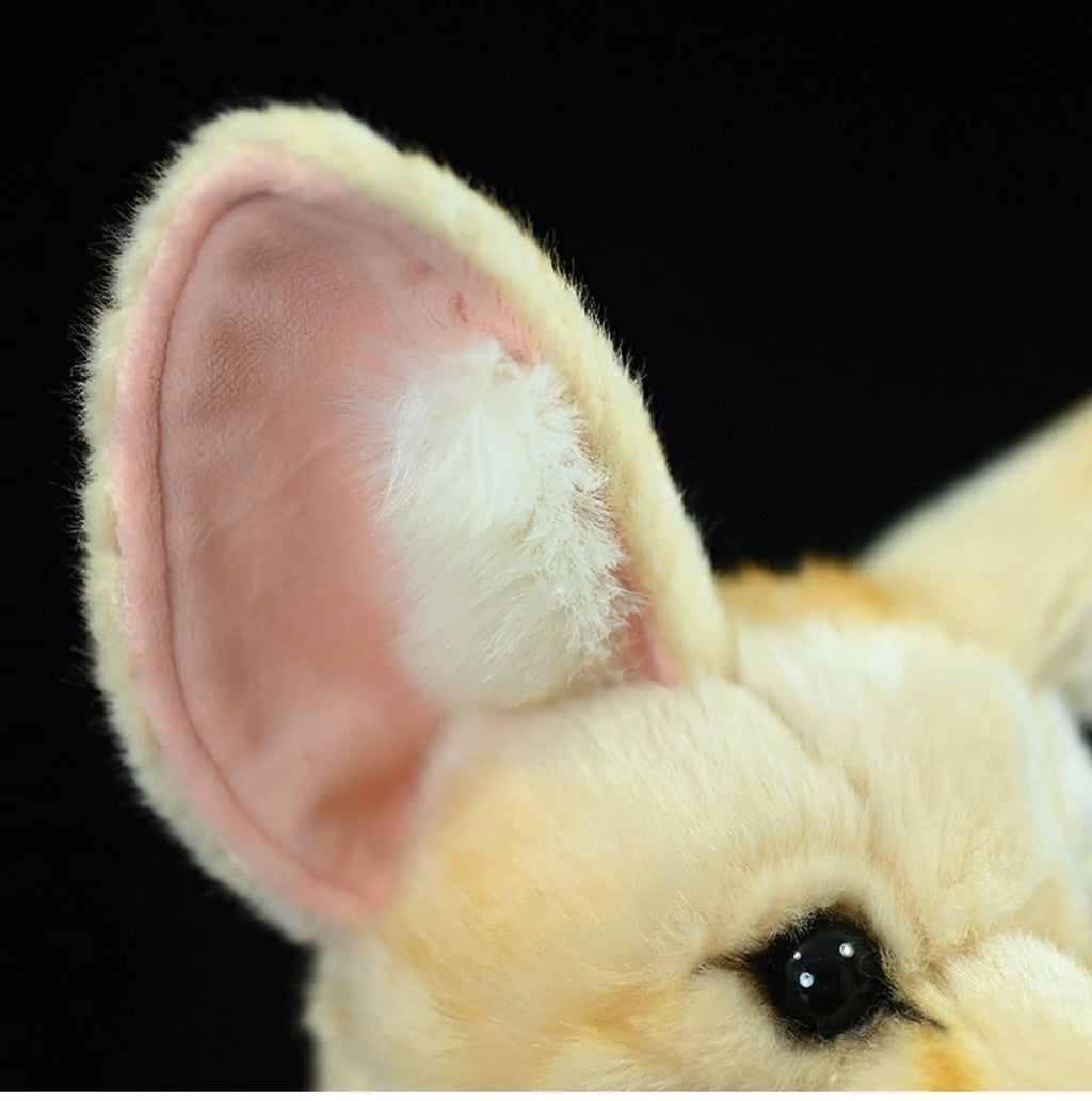 Yellow wide-eared fox plush toy standing 26cm tall on a surface
