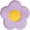 Flower-shaped silicone lick mat for cats and dogs with suction cups on the base, shown in a choice of colours.