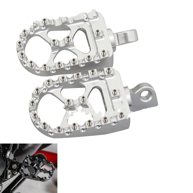 MX style wide foot pegs in red, black, or silver, 6061-T6 aluminium alloy with stainless steel teeth, 120mm x 57.5mm platform.