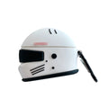 Black silicone AirPods case with motorcycle helmet shape, cartoon geometric design, and carabiner clip