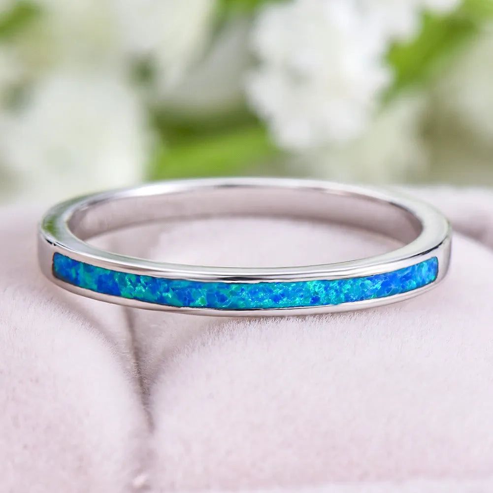 Copper ring with round blue opal stone, geometric simple design