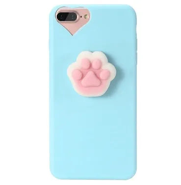 Soft pink silicone TPU phone case with a raised 3D cartoon cat design on the back, fitted to an iPhone.