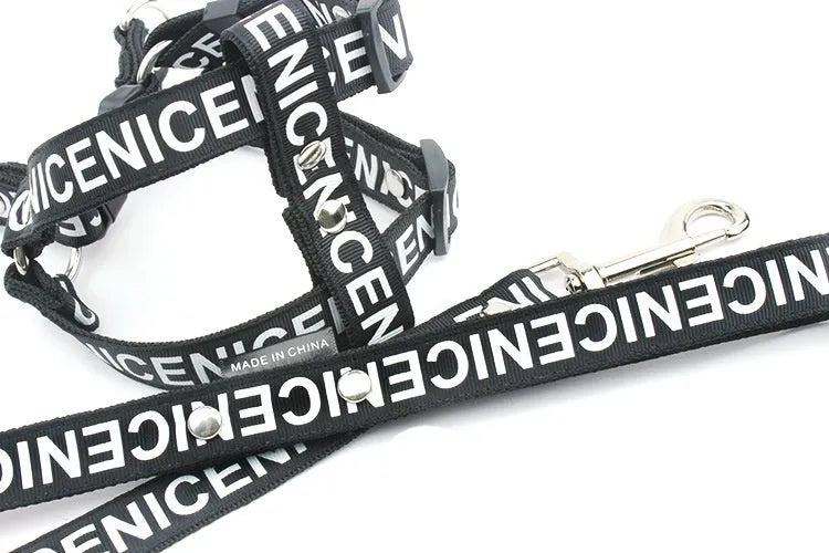 Casual polyester dog collar in black, red, or yellow with hand holding rope, sizes S M L