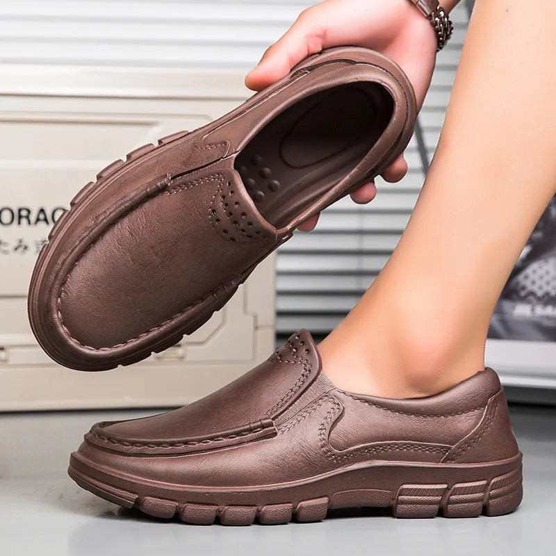 Men's black slip-on work shoes with platform heel and artificial leather waterproof upper