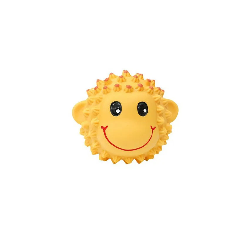 Orange and yellow spiky latex dog toys with animal designs, approximately 3 inches diameter