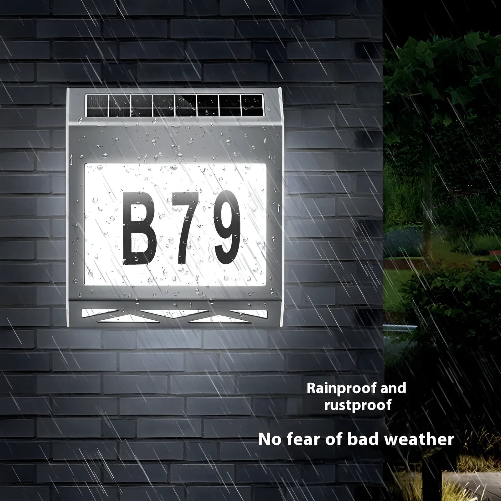 Black solar powered waterproof doorplate light with LED house numbers mounted on exterior wall