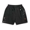 Black loose-fit men's shorts with a semi-elastic waist, zipper fly, and a colour button.