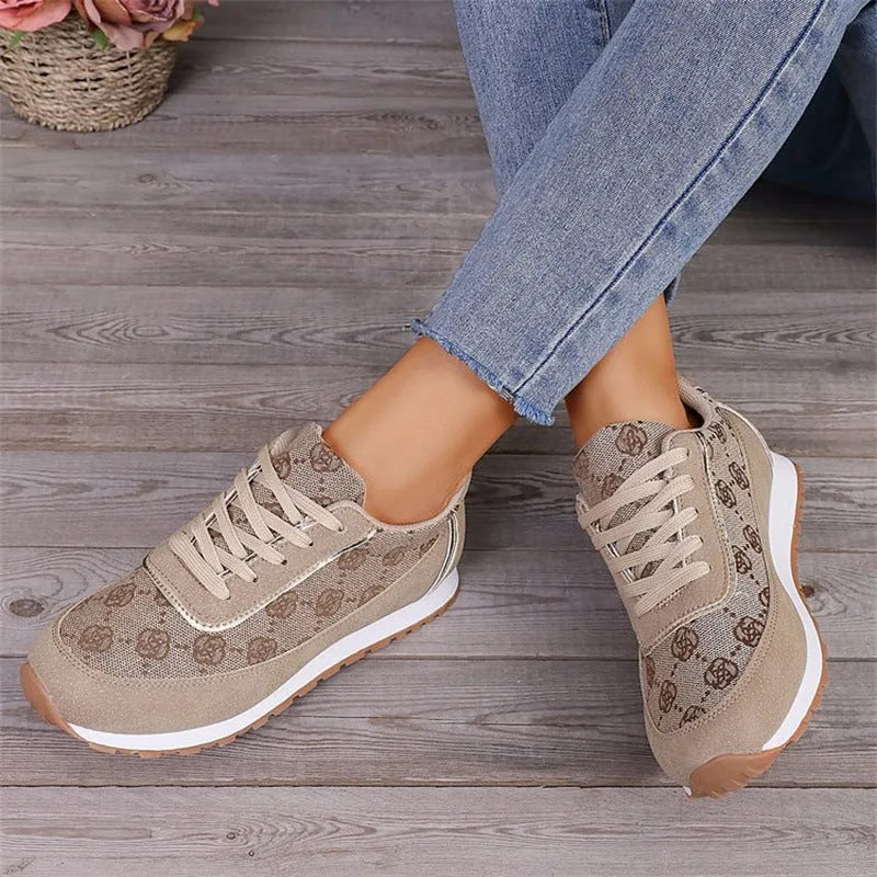 Flower print lace-up sneakers in camel with round toe and rubber sole