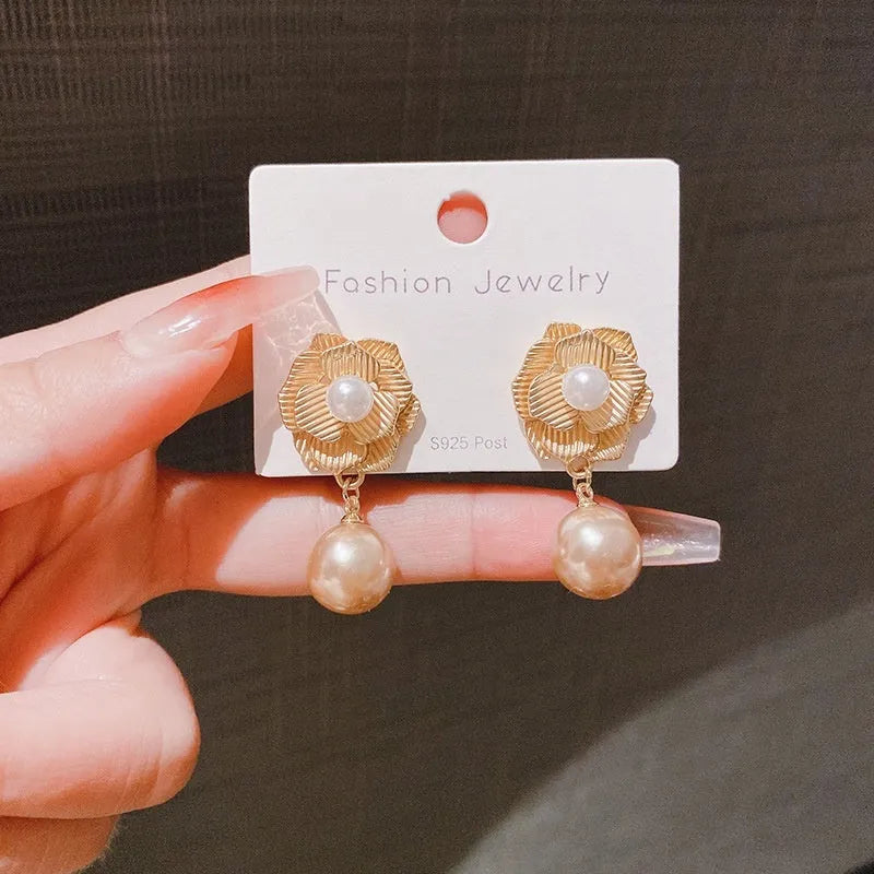 Gold electroplated Hong Kong style flower stud earrings with opal stone and needle rose pearl design