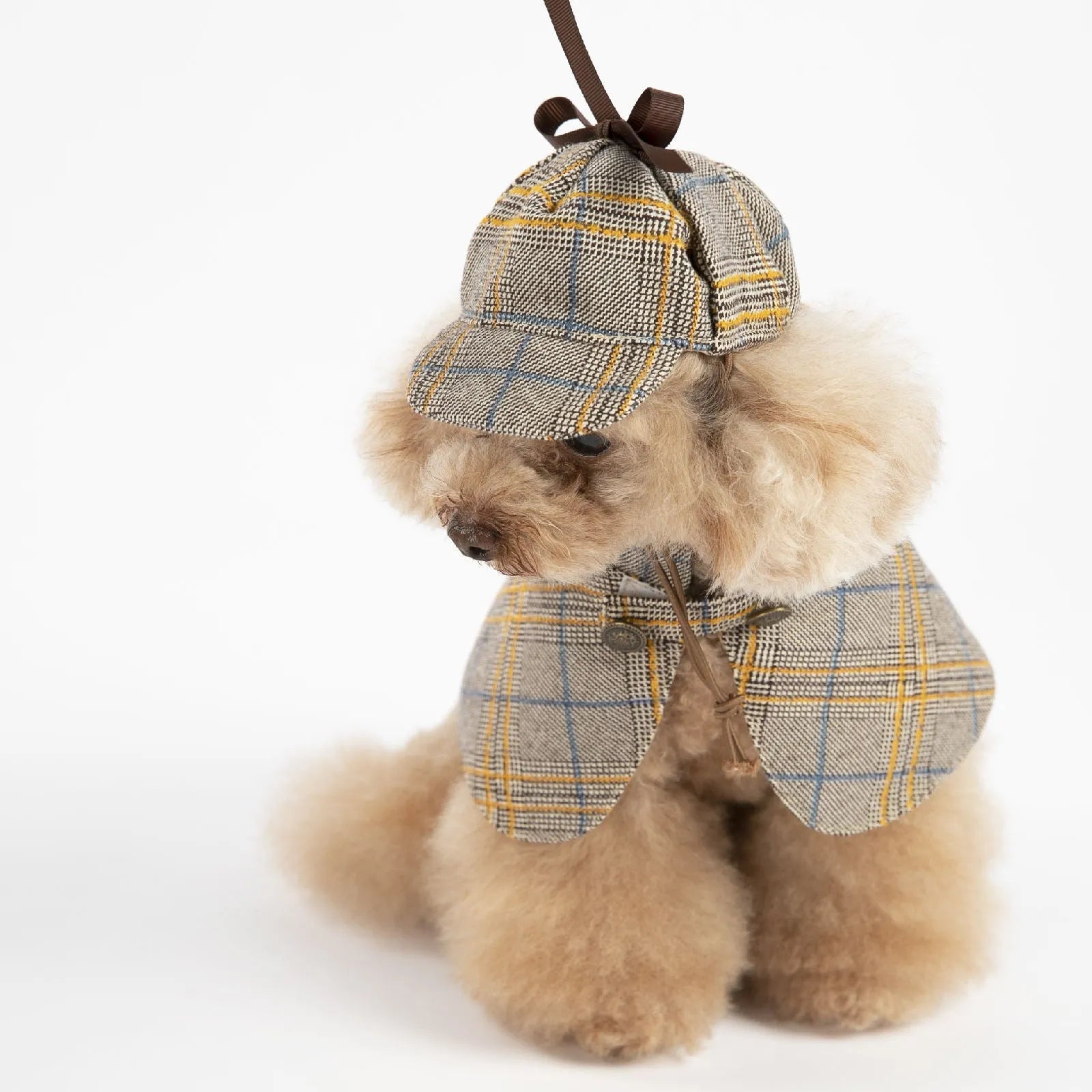 Camel-coloured cotton cloak pet clothes with an adjustable hat, shown on a mannequin.