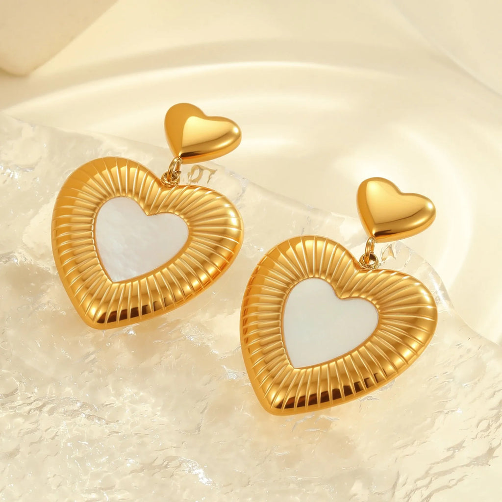 Gold electroplated heart-shaped earrings with fritillary design on stainless steel