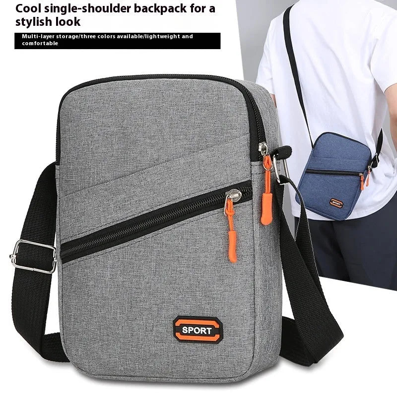 Ultra light Oxford cloth crossbody commuter bag in solid black, navy blue, or silver grey colour.