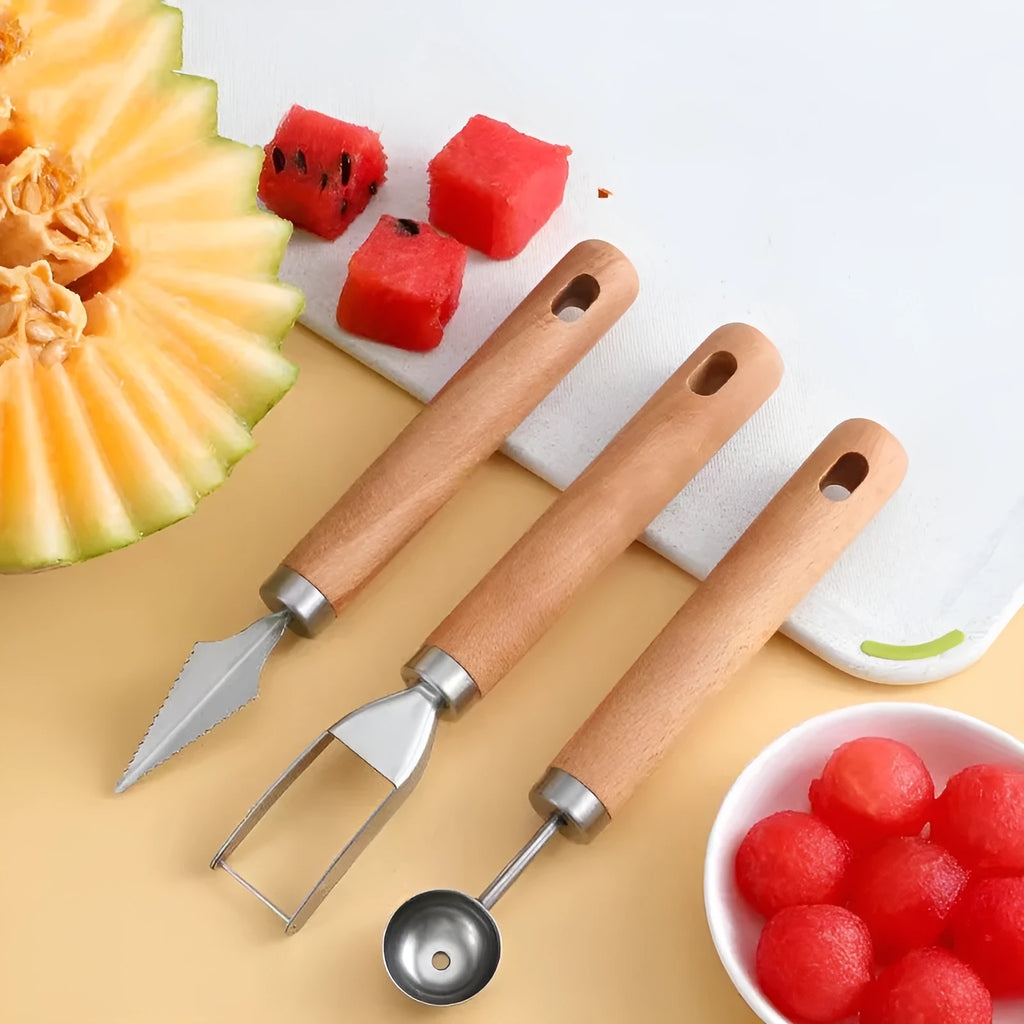 Stainless steel watermelon cutting tool set with three wooden handle gadgets for cutting squares, scooping balls, and carving