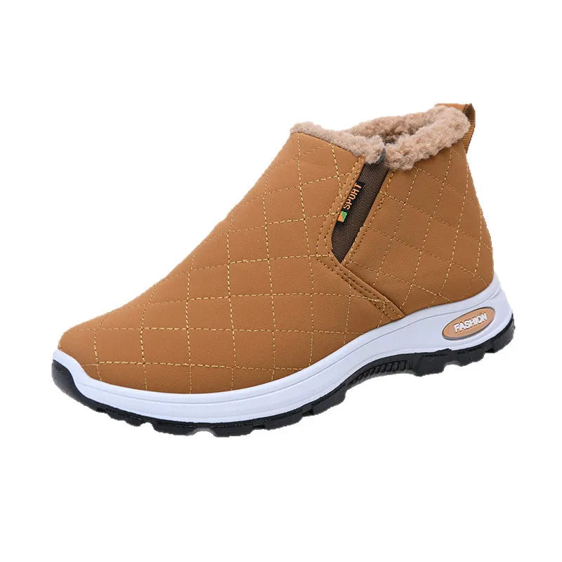 Women's thermal booties with flat heel, low top upper, round toe, velvet-look artificial leather upper and PVC sole.