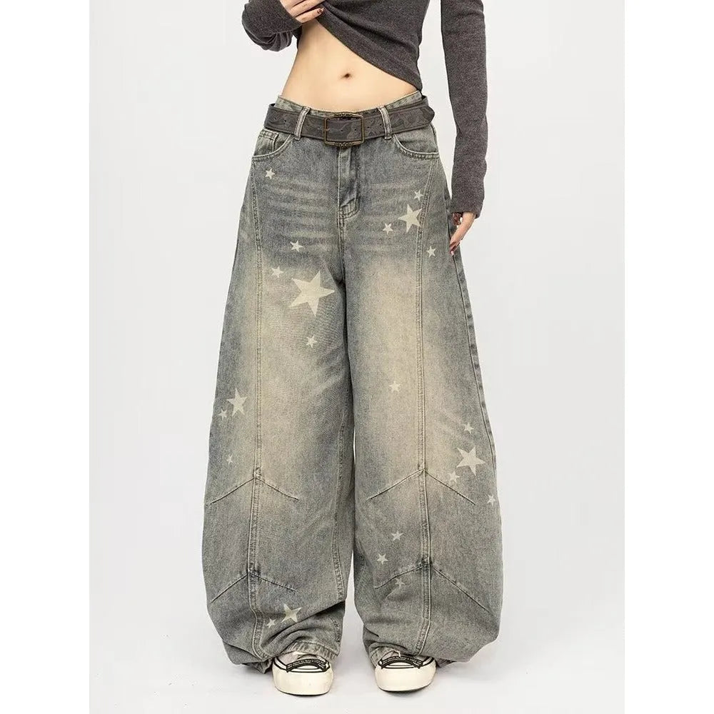 Men's blue loose fit jeans with vintage washed, distressed and grey splatter finish, mid-rise waist and long pant length.