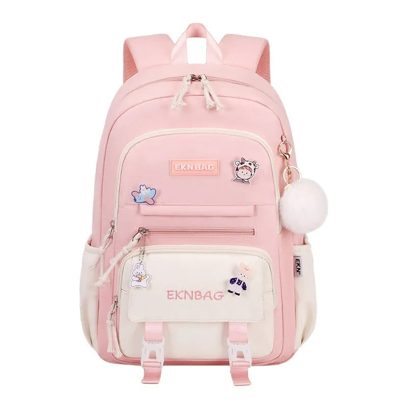 Waterproof pink Oxford cloth girls school backpack with curved straps on a white background.