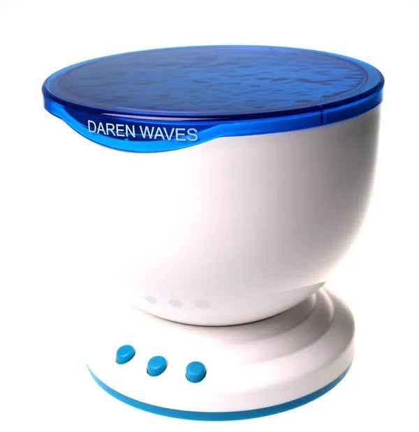 A blue ocean-themed LED projection lamp displaying aquatic imagery on a wall.