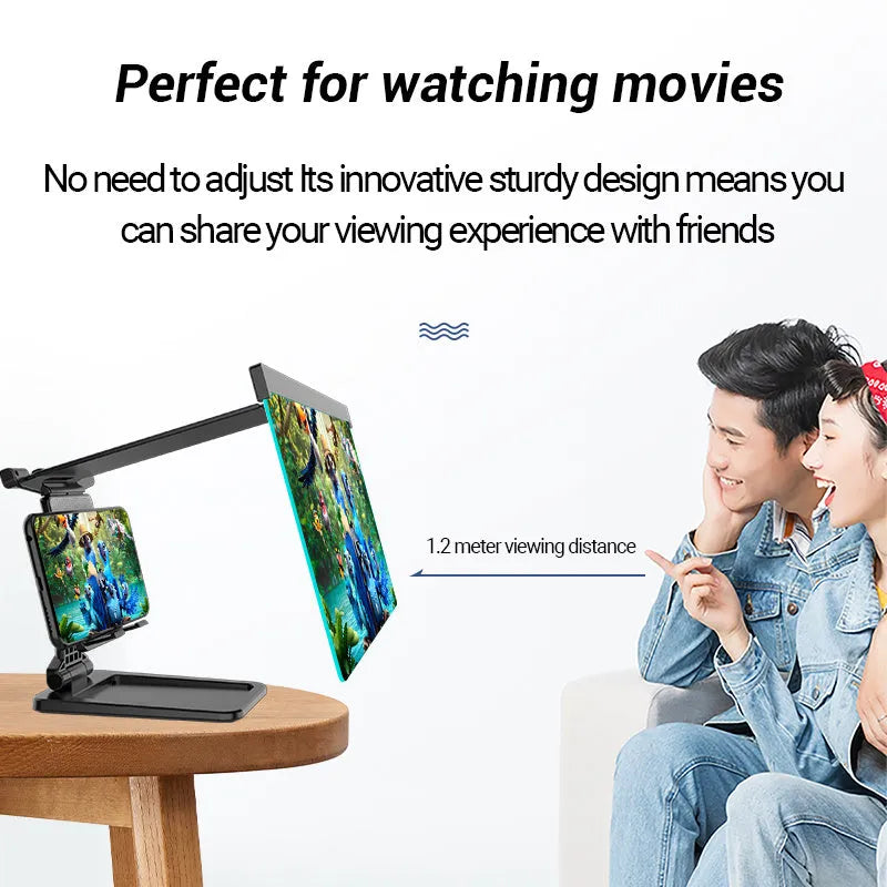 Black folding mobile phone screen magnifier with detachable holder next to an iPhone