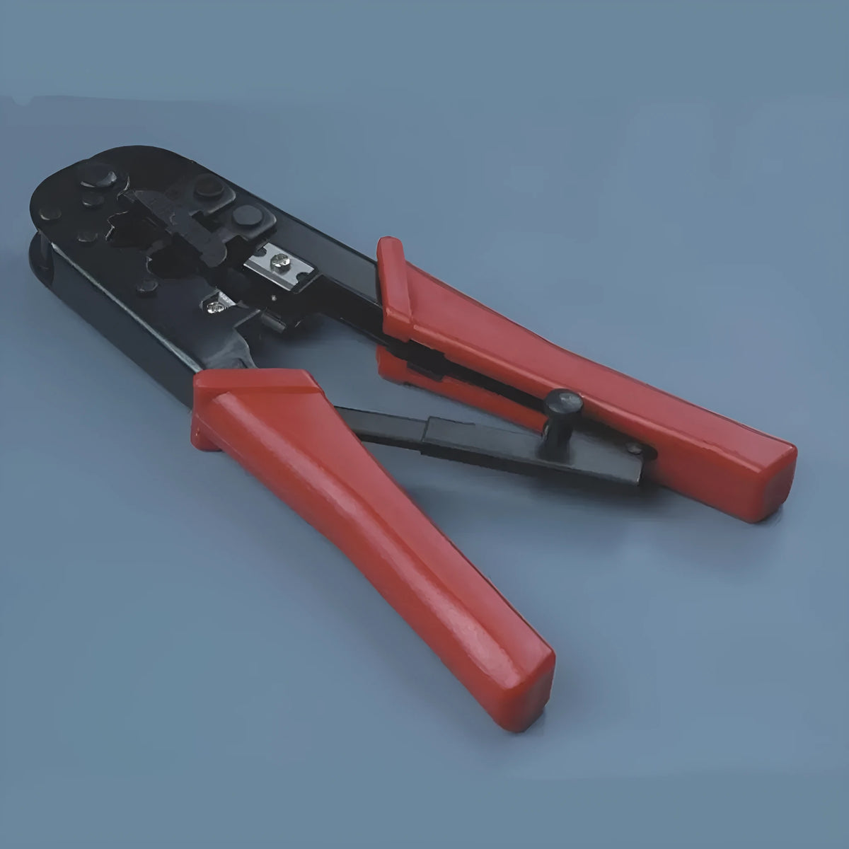 High carbon steel crimping tool with 40Cr cutter head, round mouth, and red flame retardant PC and PVC handle for cable.