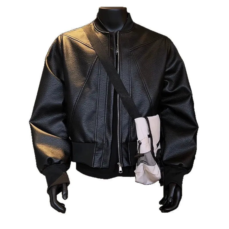 Men's black slim-fit PU leather jacket with extended length and litchi grain texture.