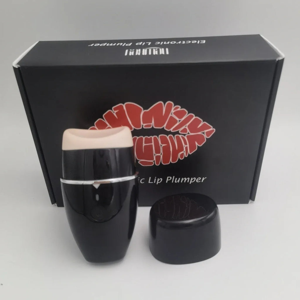 Black and white electric lip plumper device with silicone tip and USB charging cable