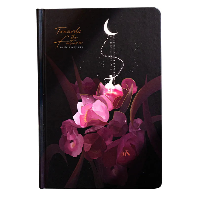 A5 notebook with luminous cover open to show internal colour illustrations, in Deep Blue, Gold, Light Blue, and Purple options