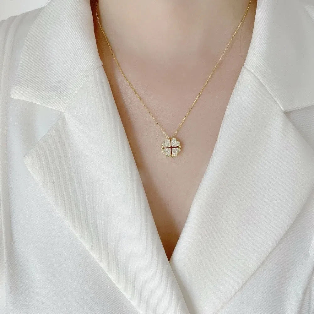 Red magnetic four-leaf clover pendant necklace with gold-plated copper on titanium steel O-link chain